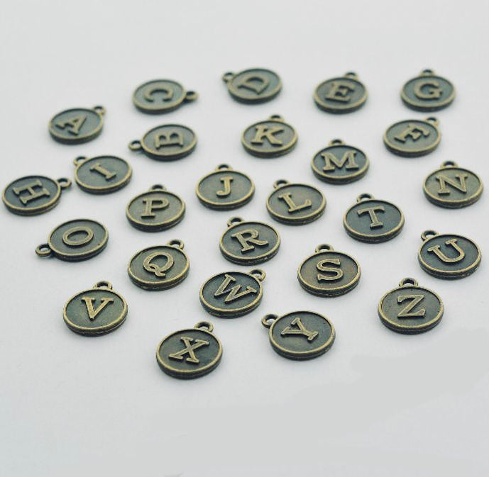 BRONZE LETTER CHARM