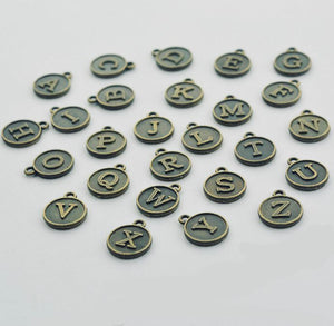 BRONZE LETTER CHARM
